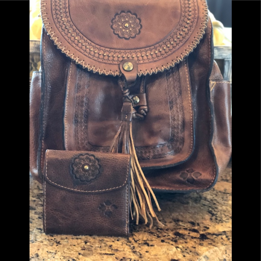 Patricia Nash book bag/purse and wallet set.